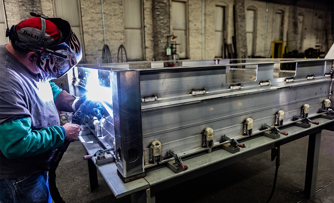 welder at the Champion GSE warehouse